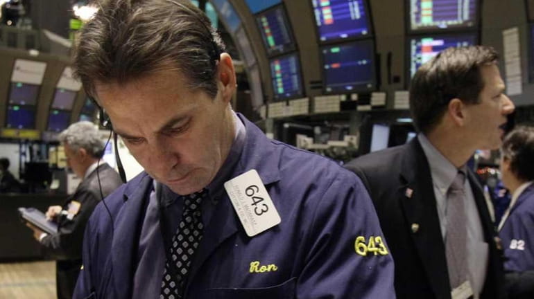Traders work the floor of the New York Stock Exchange....