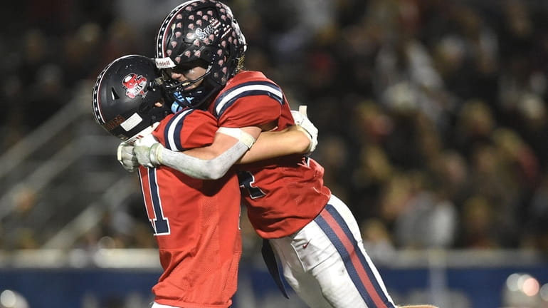 Pat Mullin of South Side, left, and Jack Lozito celebrate...