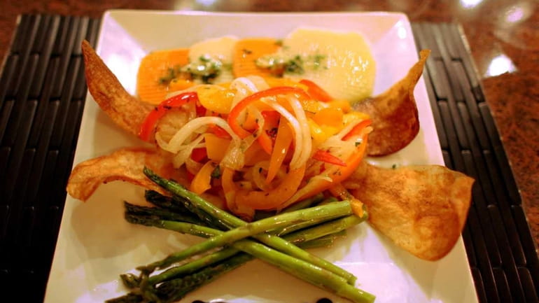 Roasted cod is one of the entrees served at Fado...