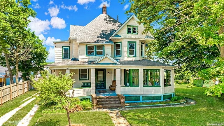 Priced at $825,000, this 1904 Victorian on Clocks Boulevard, set...