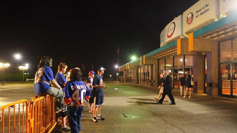 Islander fans eagerly await the result outside the Nassau Coliseum....