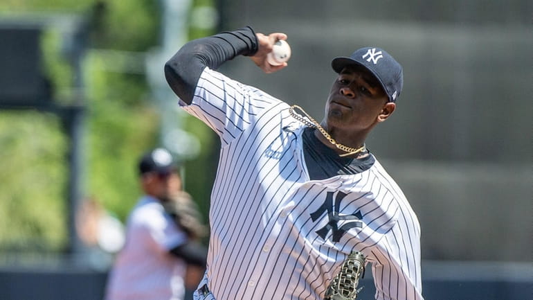 Yankees pitcher Luis Severino warms up to face the Detroit Tigers...