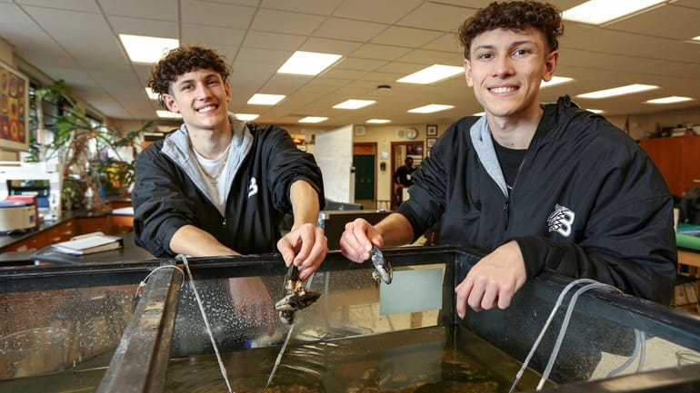 Twins Roberto, left, and Ricardo Lopez, 17, seniors at Brentwood...
