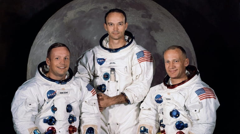 Apollo 11 commander, Neil Armstrong, left; Michael Collins, command module...