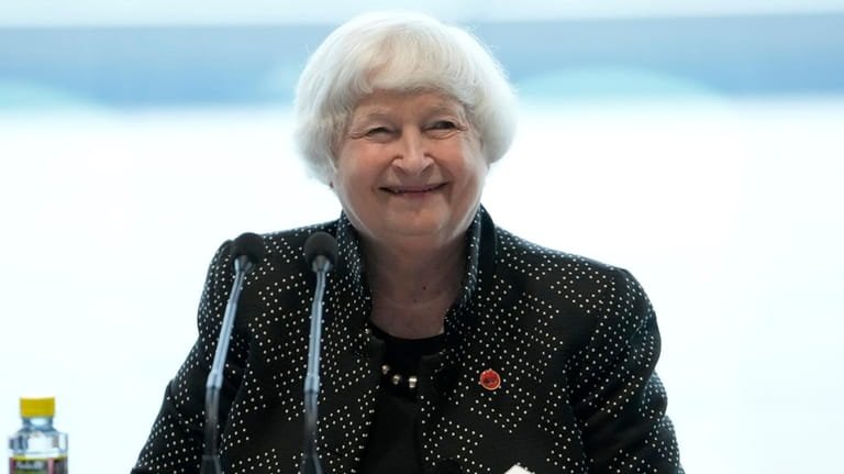 U.S. Treasury Secretary Janet Yellen smiles at the Business Leaders...