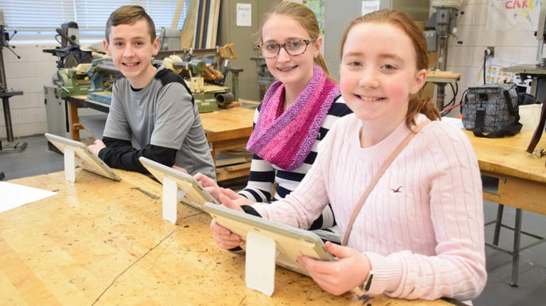 In Holbrook, Seneca Middle School students recently explored new technology-based...