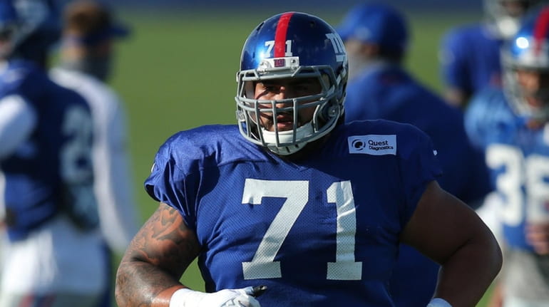Giants offensive lineman Will Hernandez (71) stretches during training camp...