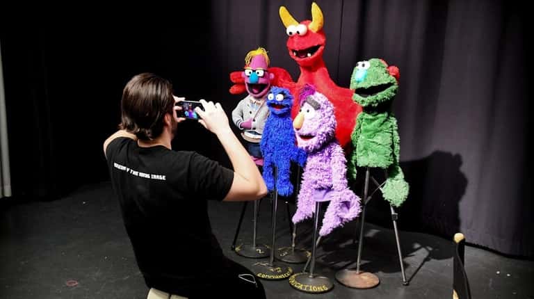 Sebastiano Ricci takes a photo of his puppets in Studio...
