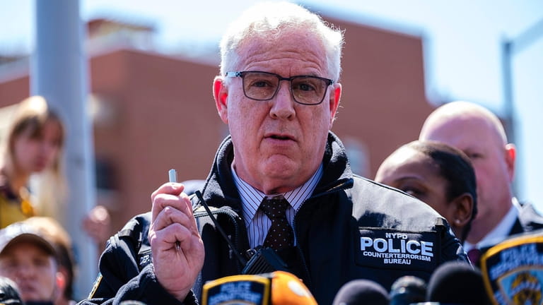 NYPD Deputy Commissioner John Miller speaks during a news conference...