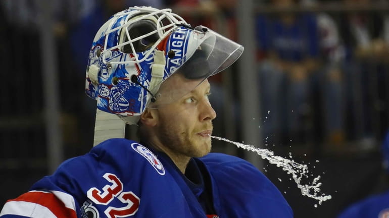Antti Raanta #32 of the New York Rangers takes a...