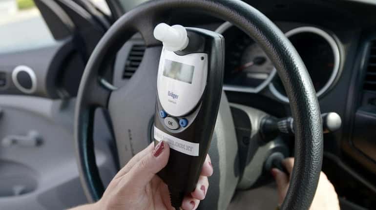 An interlock device is demonstrated in a vehicle in the...