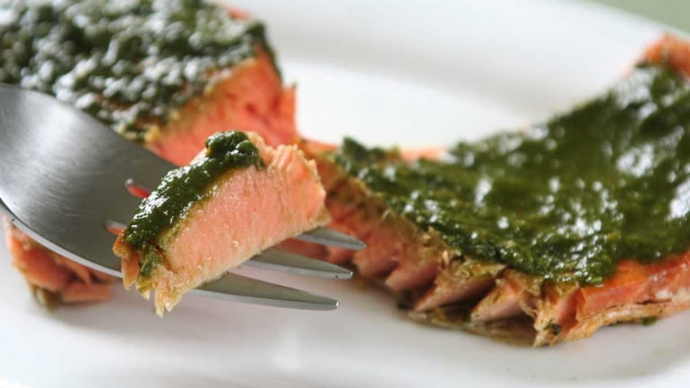 Wild Sockeye salmon is topped with a puree made from...