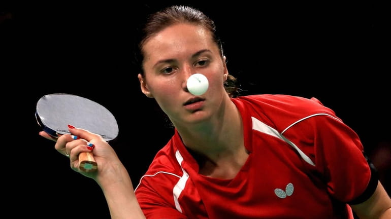 Maria Dolgikh of Russia plays table tennis at the 2016...