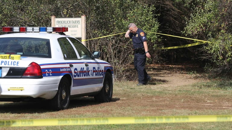 Suffolk County police investigate the scene at Froehlich Farm Nature...