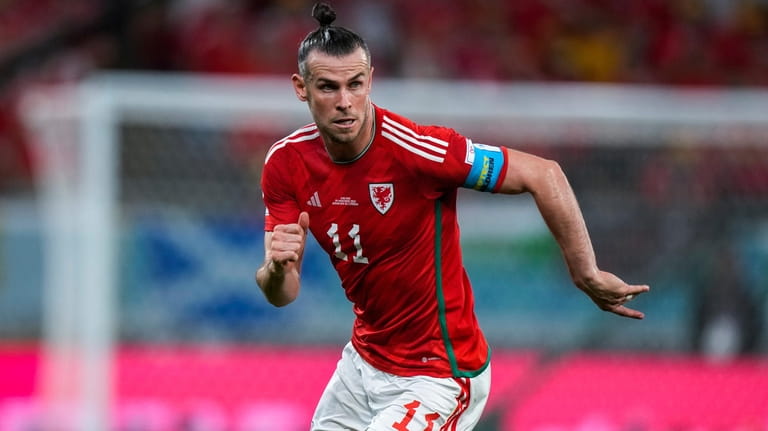 FILE - Wales' Gareth Bale runs during the World Cup...