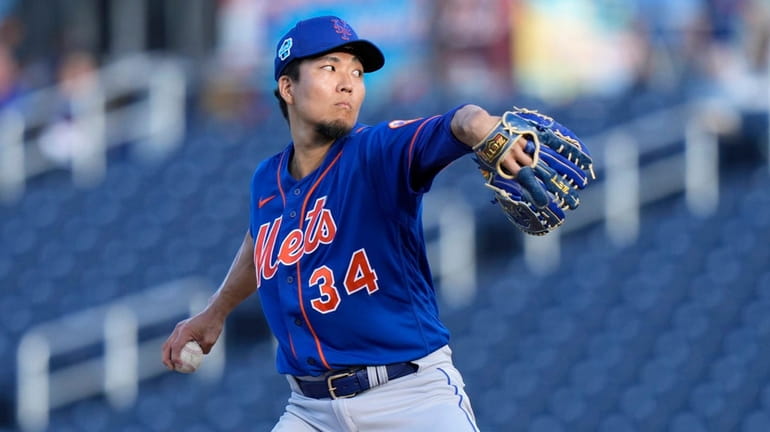 Mets starting pitcher Kodai Senga, of Japan, throws during the...