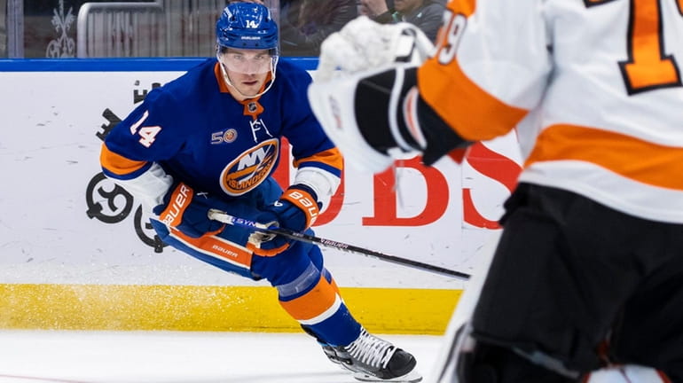 New York Islanders center Bo Horvat skates toward goal in...