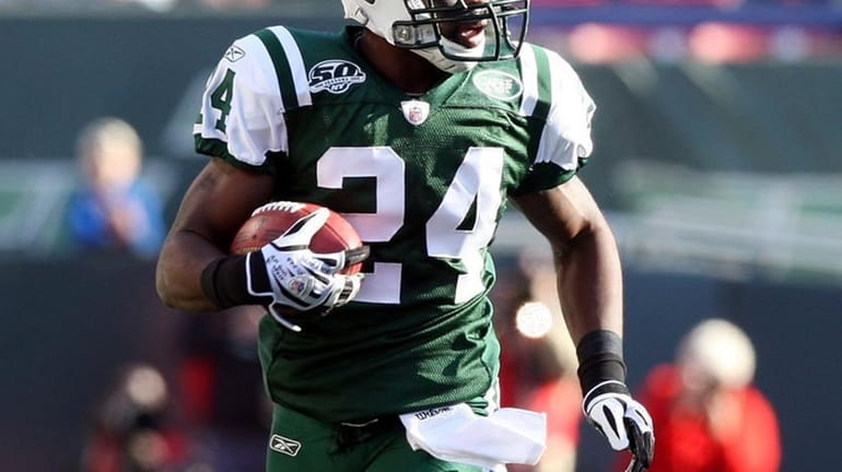 Darrelle Revis #24 of the New York Jets runs the...