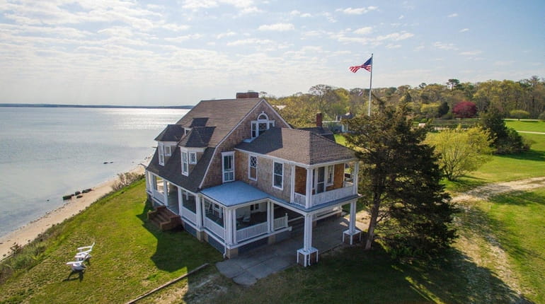 The historic waterfront estate in Hampton Bays served as a...