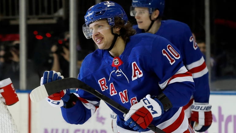 Artemi Panarin of the Rangers celebrates his first period goal against...