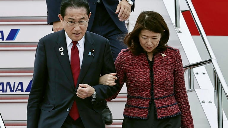 Japanese Prime Minister Fumio Kishida, left, and his wife Yuko...