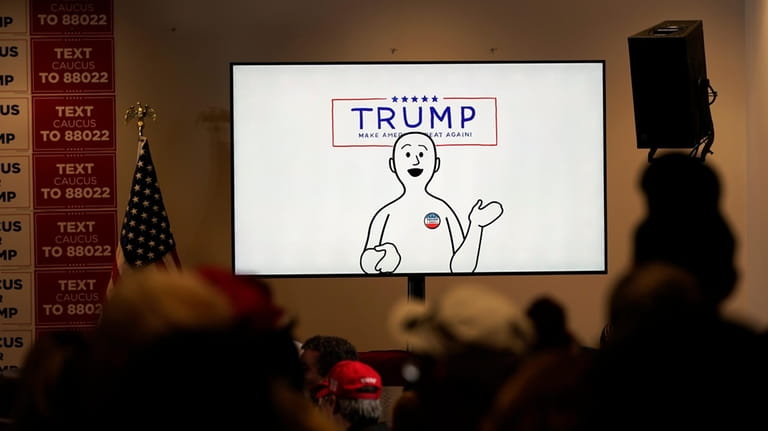A video plays before former President Donald Trump speaks at...