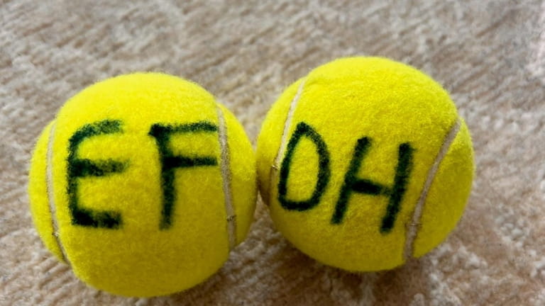 Jericho eighth grader Nicholas Chin prepared these tennis balls and...