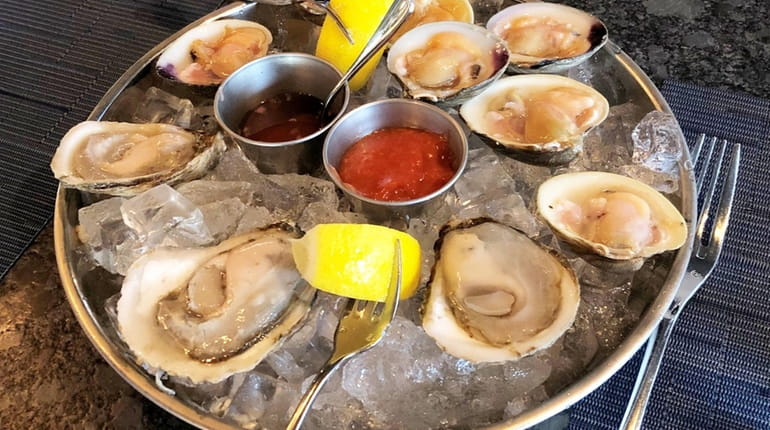 Local oysters and clams on the half-shell at Schultzy's, a...