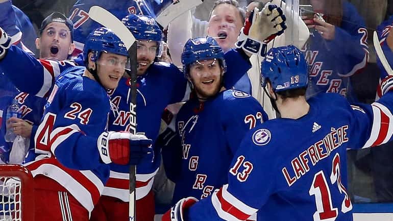 Filip Chytil of the New York Rangers celebrates his first...