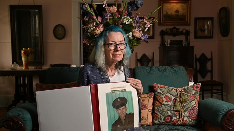 Portrait of Judy Wade, niece of Luther Story, with memory...