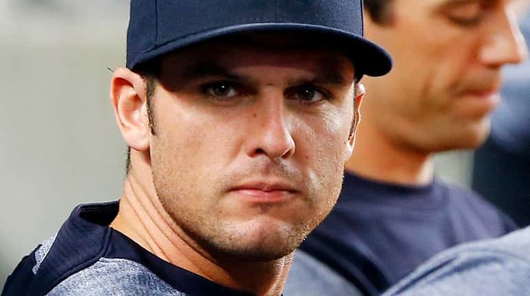 Greg Bird of the New York Yankees looks on during...