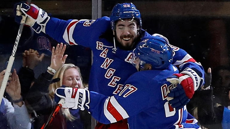 Mika Zibanejad of the Rangers celebrates his overtime goal against the...