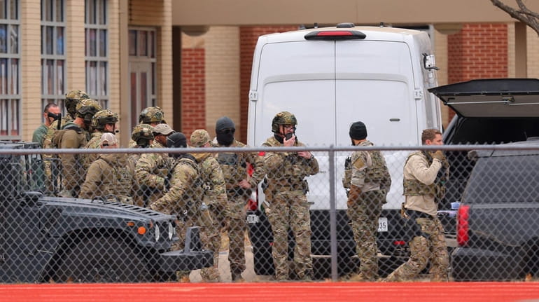 SWAT team members near the Congregation Beth Israel Synagogue in...