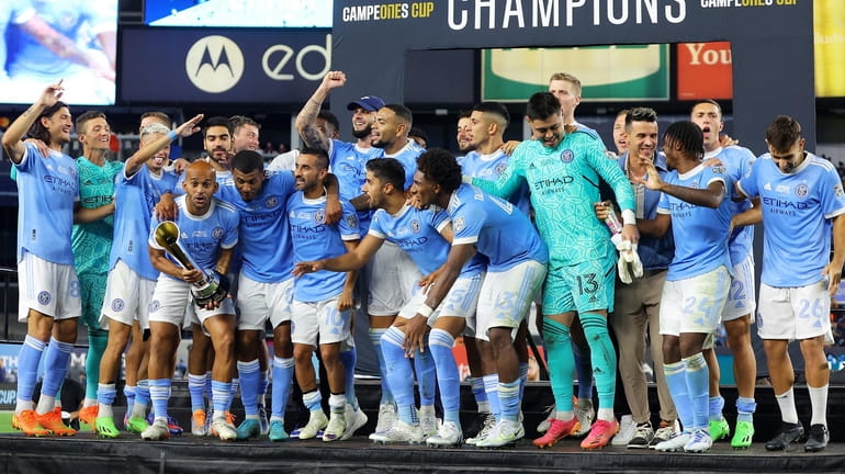 New York City FC celebrates after defeating Atlas to win...
