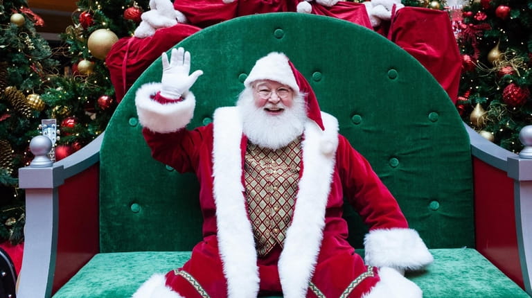 This year, Roosevelt Field's Santa Claus can sit close or be...