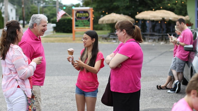 Participants in the Long Island Ice Cream Tour wear color-coordinated...