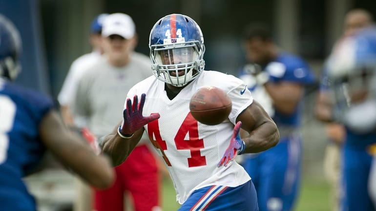 Giants RB Andre Williams catches a pass from QB Eli...