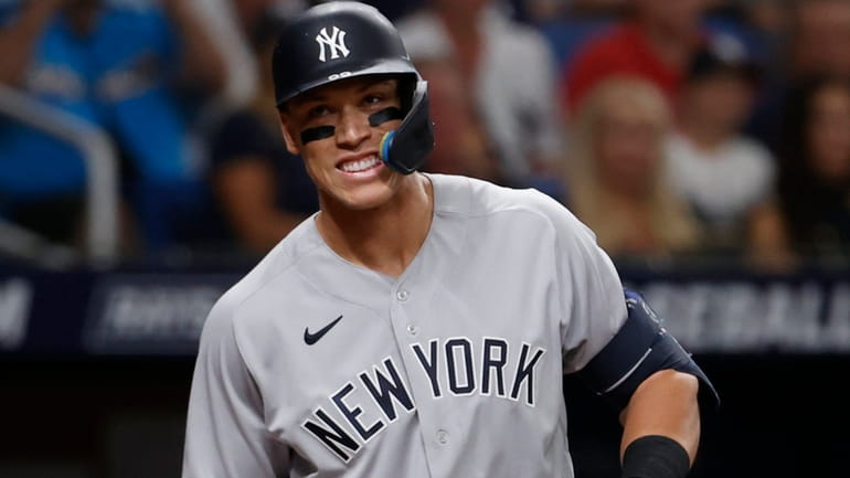 The Yankees' Aaron Judge reacts after striking out looking against...