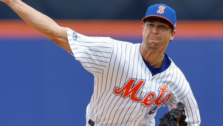 The Mets' Jacob deGrom pitches for Triple-A Syracuse against Omaha in...