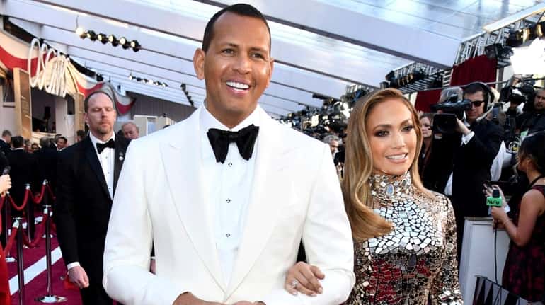 Alex Rodriguez and Jennifer Lopez attend the Oscars at the Dolby Theatre...