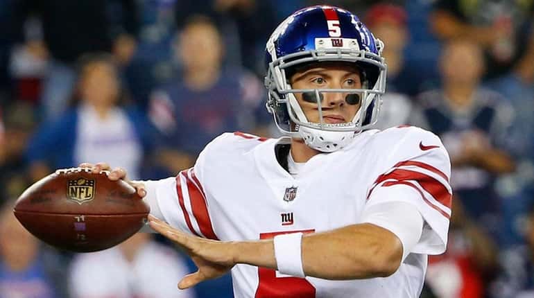 Giants quarterback Davis Webb looks to pass during the second...