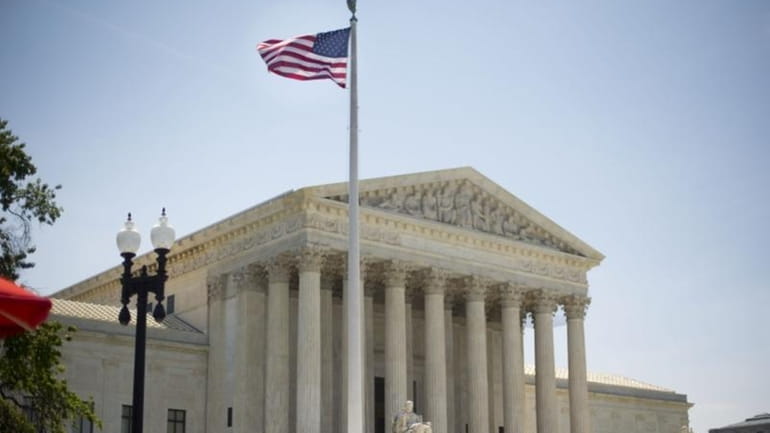 The Supreme Court building in Washington, Monday, June 30, 2014,...