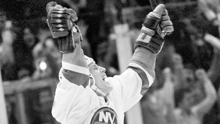 Mike Bossy of the Islanders is jubilant after scoring his 50th...