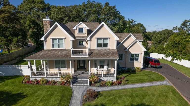 Priced at $825,000, this five-bedroom, three-bath Colonial on Highview Drive...