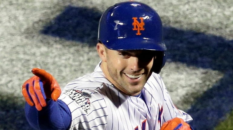 David Wright celebrates his two-run homer in the first inning...