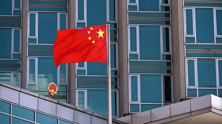 A Chinese flag flies at the Consulate General of the People's Republic...