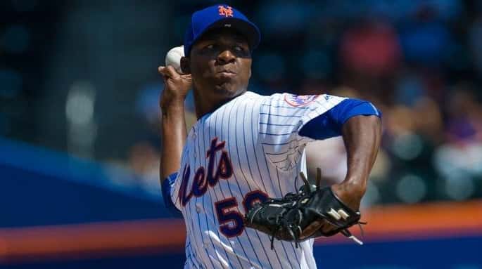 Mets pitcher Rafael Montero throws against the Phillies at Citi...
