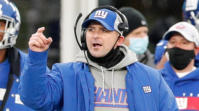 Head coach Joe Judge of the Giants reacts on the sidelines...