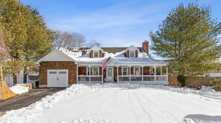Priced at $599,999, this four-bedroom, three-bathroom expanded Cape on Dressler...