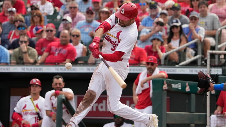St. Louis Cardinals' Dylan Carlson hits an RBI single during...